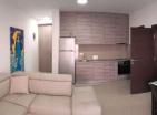 Impresionante apartamento de 90 m2 y 2 dormitorios en Donja Lastva, refugio costero con terraza