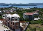 Pamje e re e detit lux apartament me zbritje në Tivat në fazën e ndërtimit