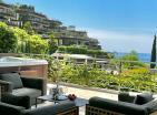 Apartamento de lujo de 2 dormitorios con vistas al mar en Dukley Gardens, Budva con jacuzzi