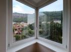 Encantador apartamento de un dormitorio y 55 m2 en Budva con hermosas vistas al parque verde